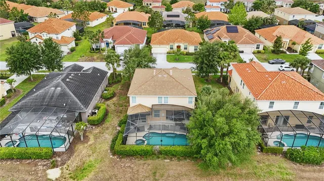 a dining room with furniture window and wooden floor