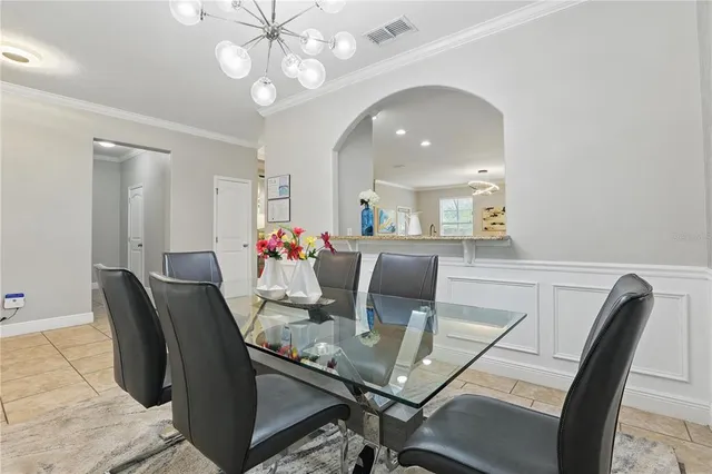 a kitchen with stainless steel appliances granite countertop a refrigerator stove a sink and dishwasher