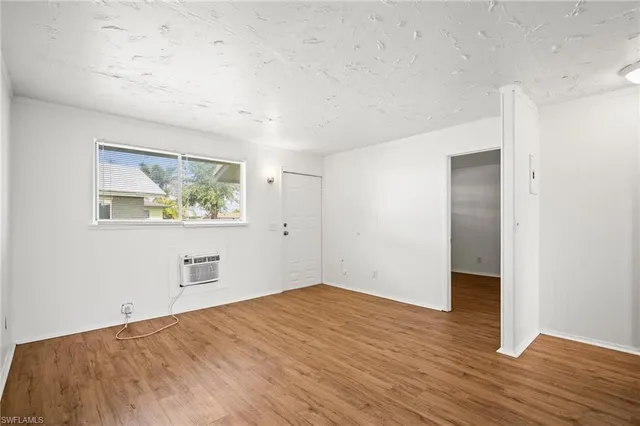 a kitchen with a stove and a sink