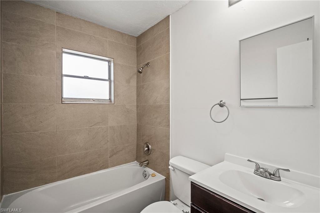 3215 Jeffcott Street Fort Myers, FL 33916 - Photo 27 of 33 Full bath featuring bathtub / shower combination and vanity