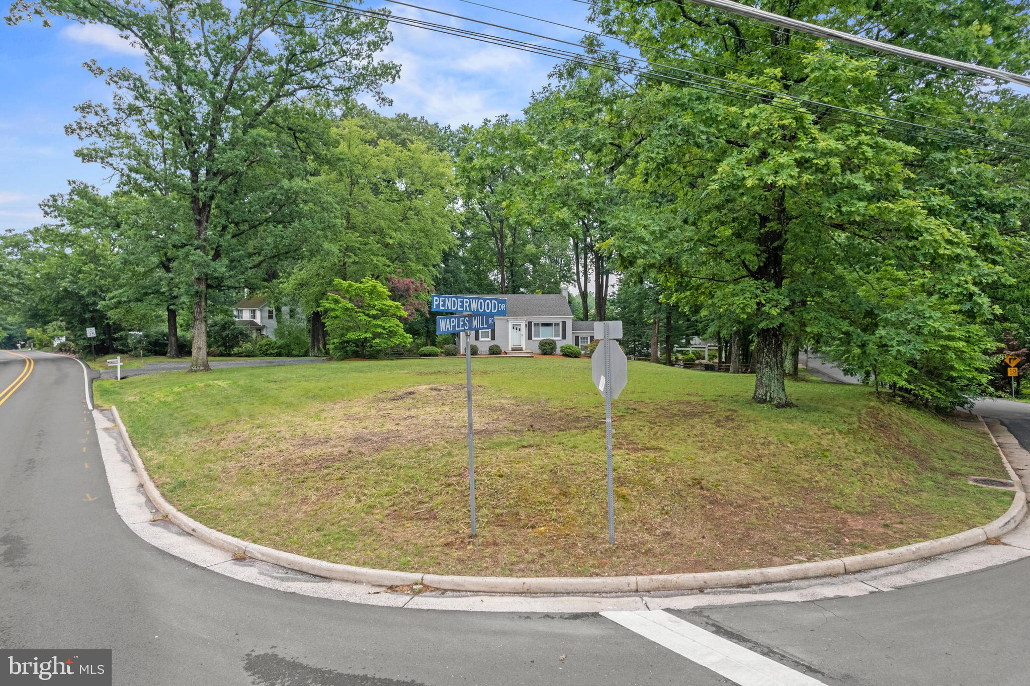 12131 Waples Mill Road Oakton, VA 22124 - Photo 33 of 40 a view of a swimming pool with a patio