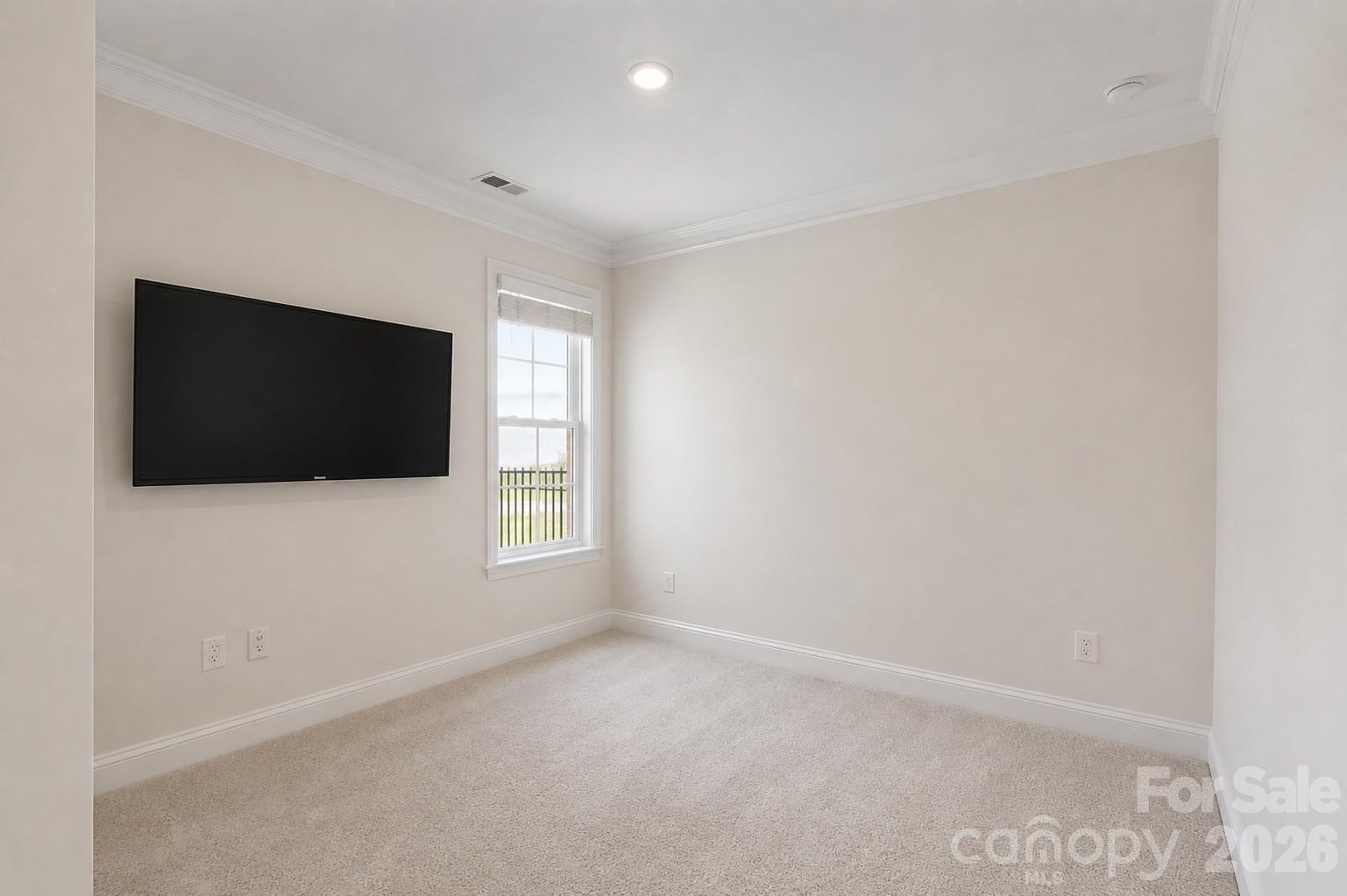 8119 Warford Little Road Denver, NC 28037 - Photo 22 of 43 a view of a livingroom with a flat screen tv