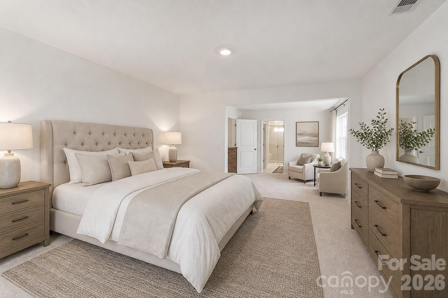 8119 Warford Little Road Denver, NC 28037 - Photo 27 of 43 a spacious bedroom with a bed and a couch