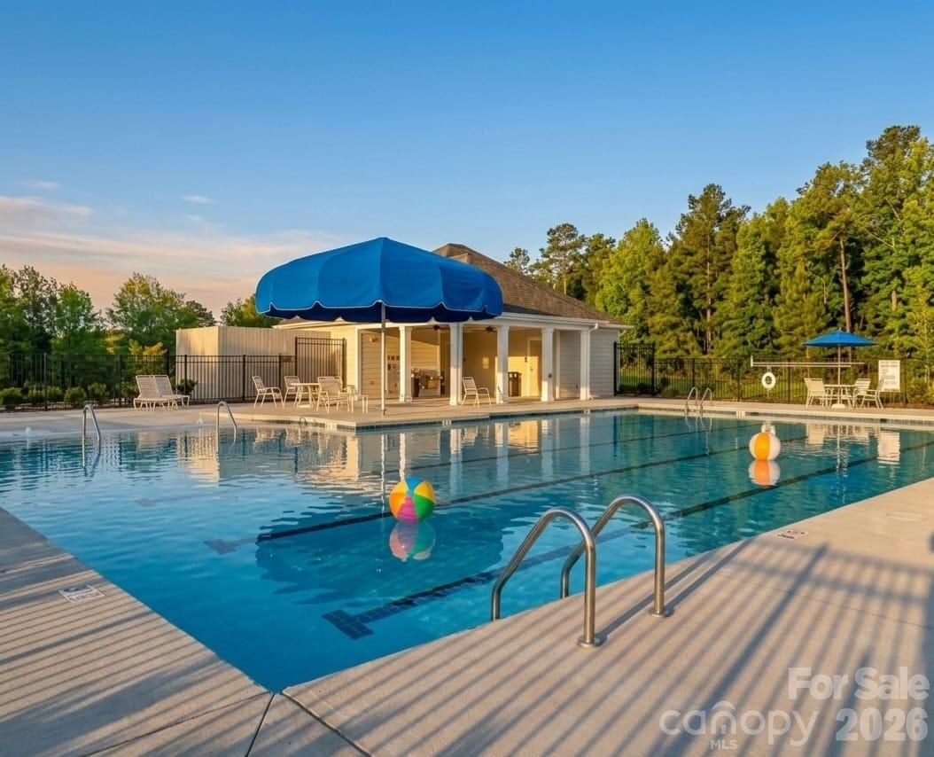 8119 Warford Little Road Denver, NC 28037 - Photo 41 of 43 a view of a swimming pool with a patio