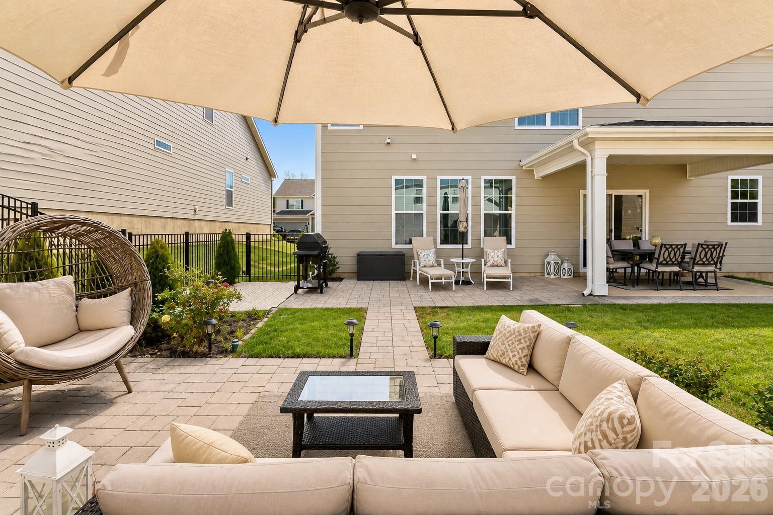 8119 Warford Little Road Denver, NC 28037 - Photo 5 of 43 a view of patio with couches table and chairs