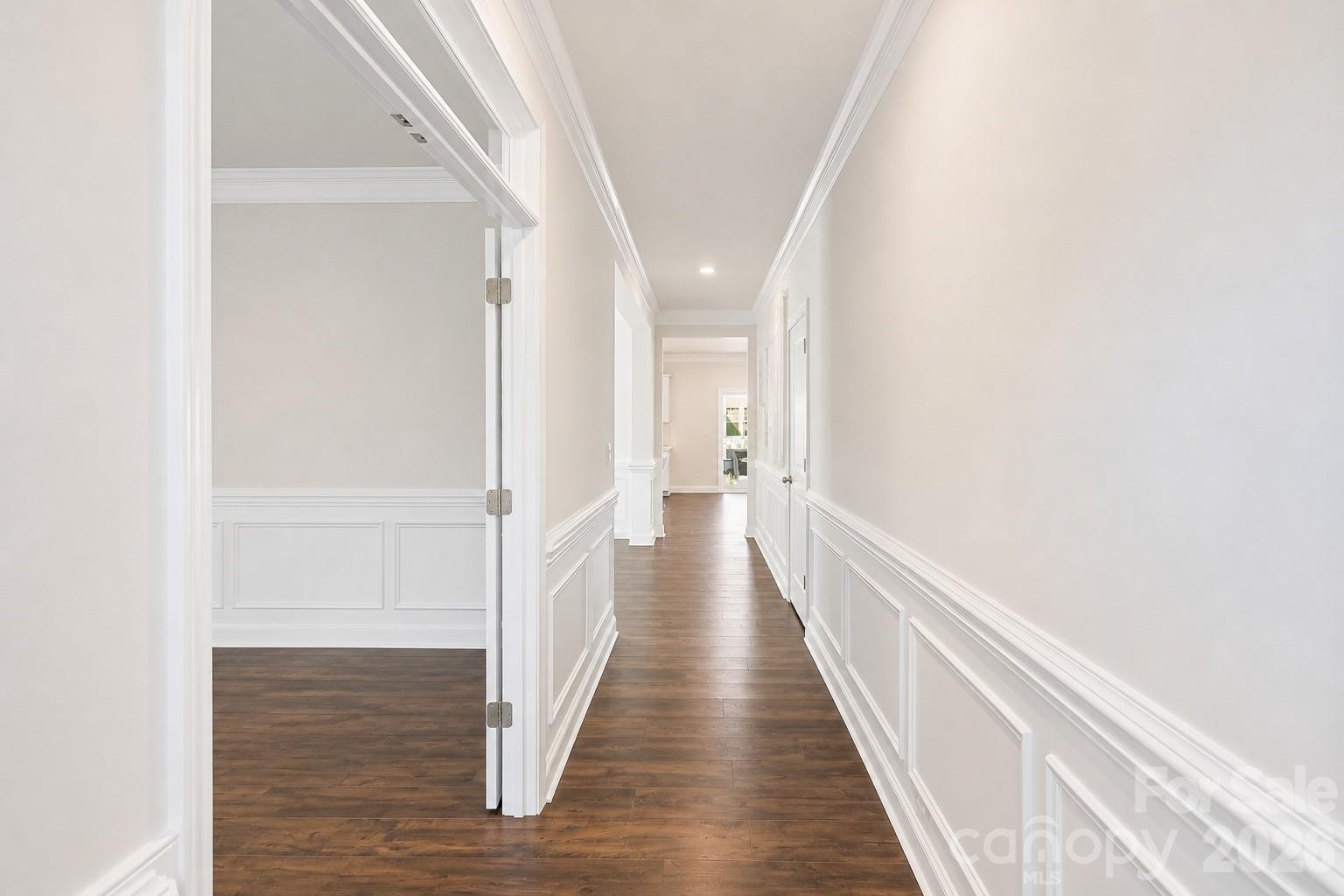 8119 Warford Little Road Denver, NC 28037 - Photo 10 of 43 a view of a hallway with wooden floor