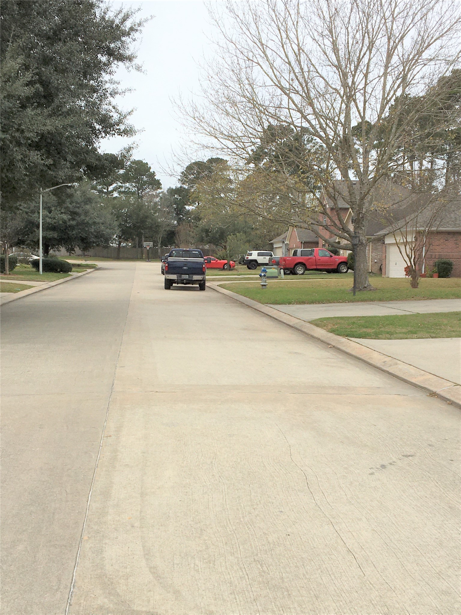 2214 Valley View Crossing Conroe, TX 77304 - Photo 2 of 23 a view of street with houses