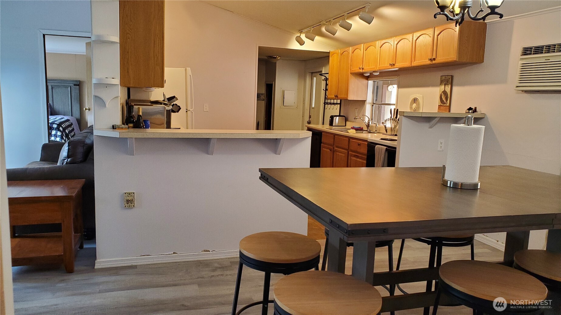 25619 Camp 12 Road Leavenworth, WA 98826 - Photo 2 of 29 a view of a dining room with furniture and wooden floor