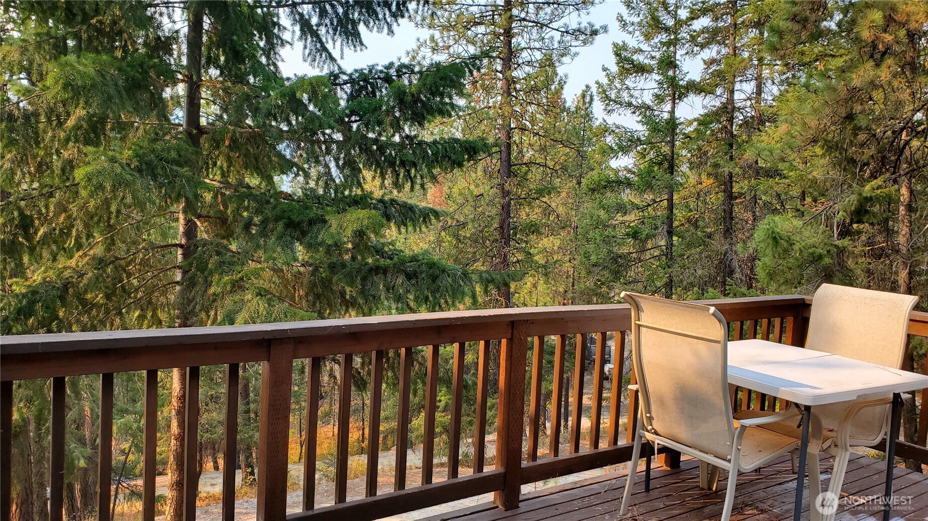 25619 Camp 12 Road Leavenworth, WA 98826 - Photo 22 of 29 a view of a chair and table in the balcony