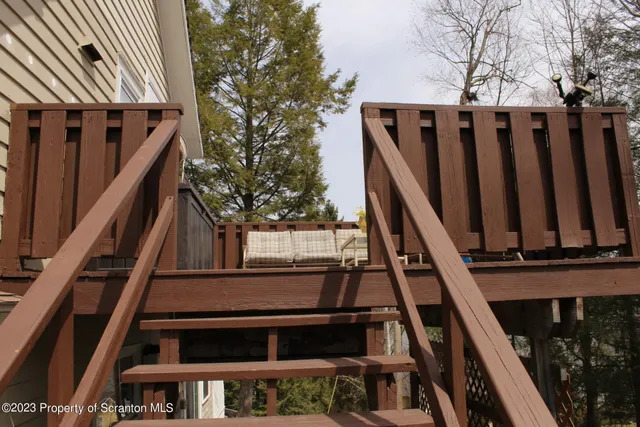 a view of stairs and an oven