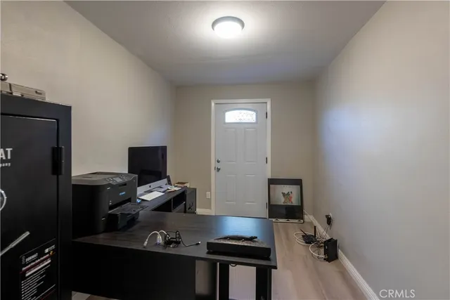 a workspace with furniture and lamp