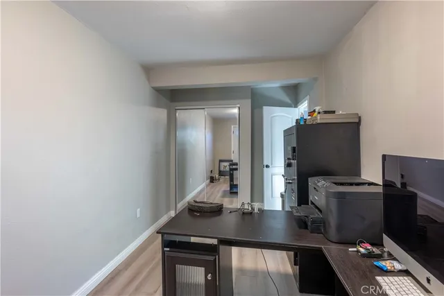 a view of a workspace with furniture