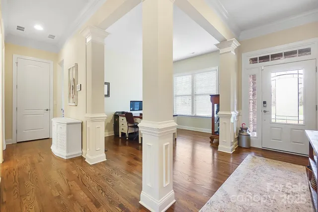 a view of a living room and dining room