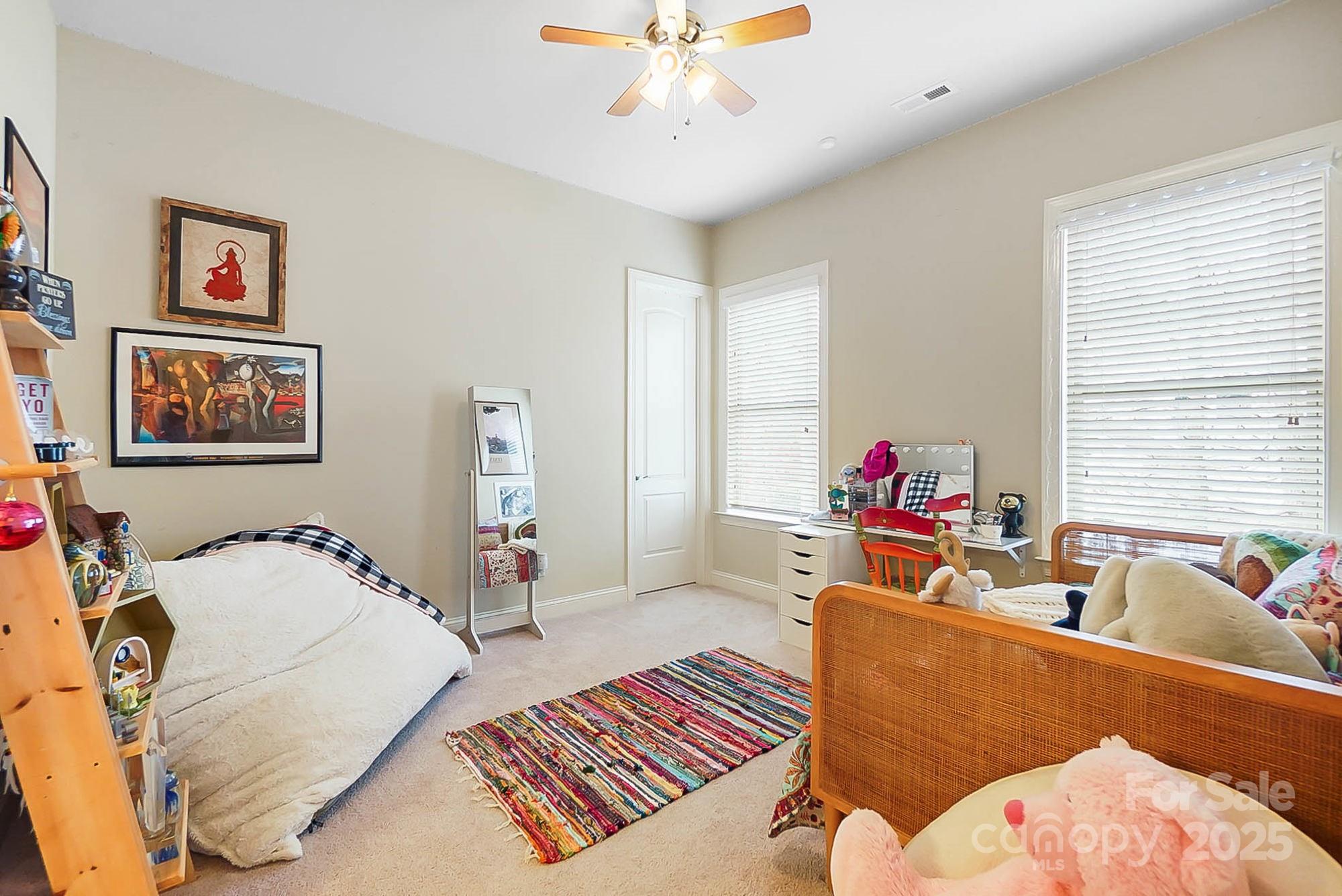 1419 Vickery Drive Matthews, NC 28104 - Photo 29 of 48 a living room with furniture and a large window