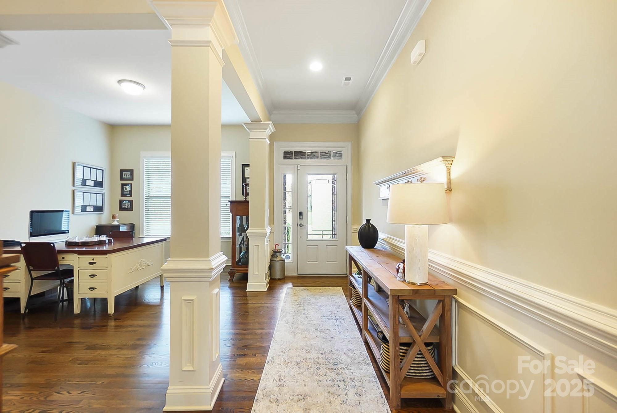 1419 Vickery Drive Matthews, NC 28104 - Photo 3 of 48 a living room with furniture and a wooden floor