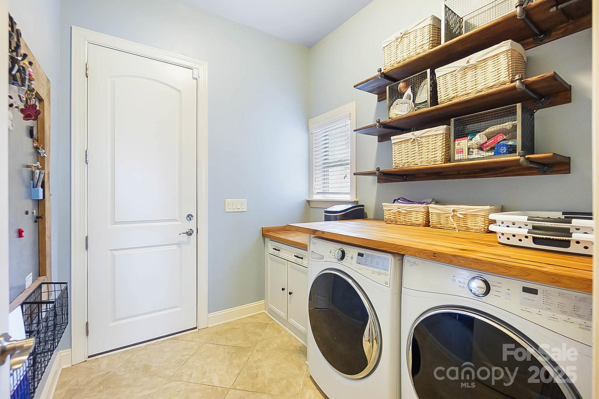 1419 Vickery Drive Matthews, NC 28104 - Photo 32 of 48 a utility room with dryer and washer