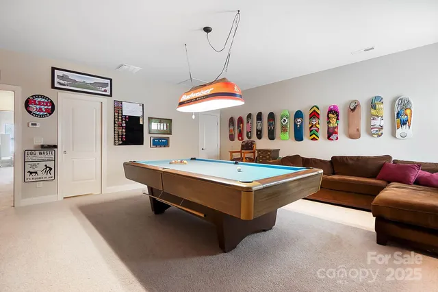 a living room with furniture and a table