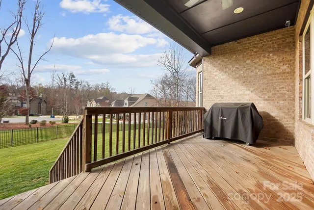 a view of balcony with yard