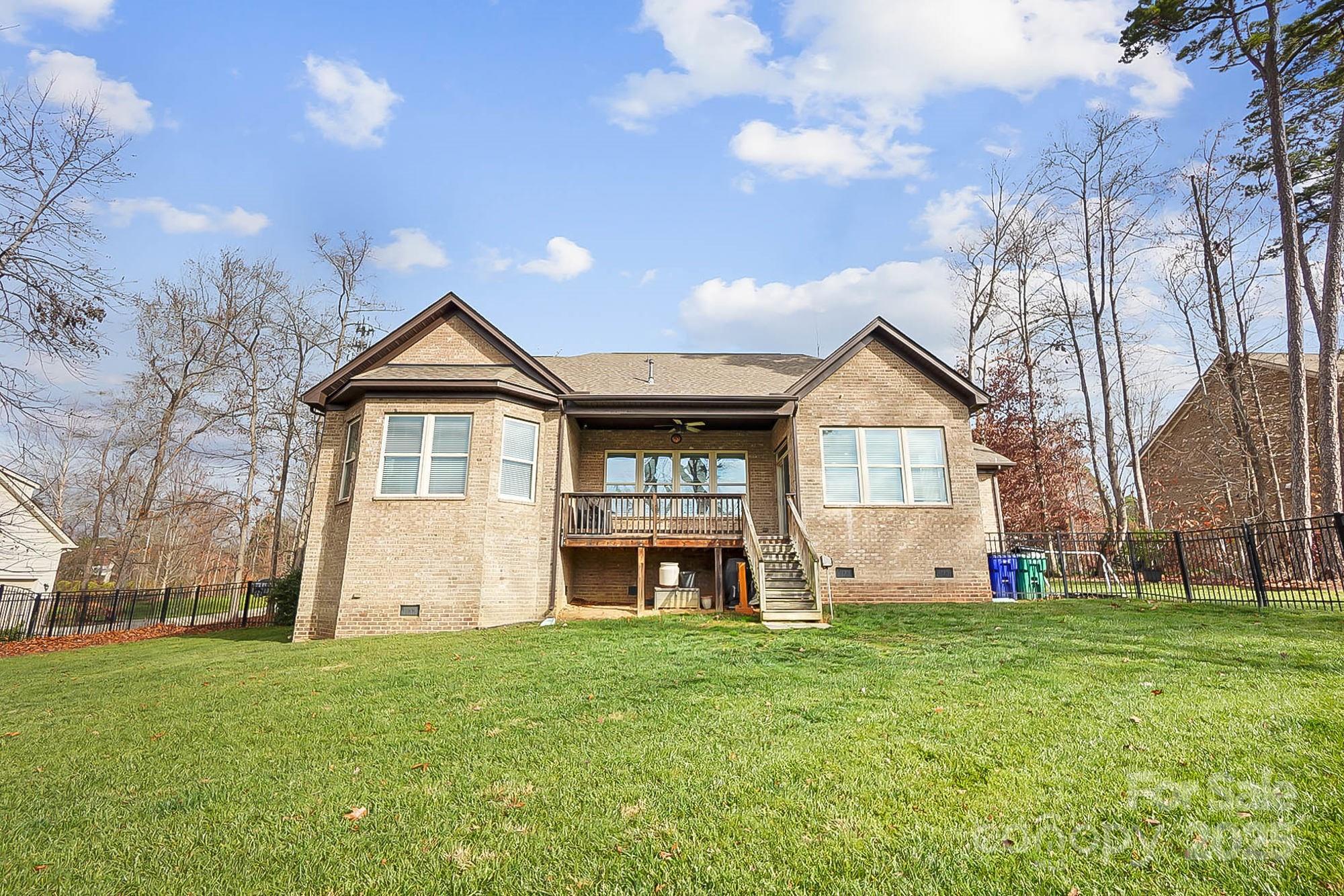1419 Vickery Drive Matthews, NC 28104 - Photo 43 of 48 a front view of house with yard and green space