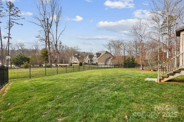 a view of a park with large trees