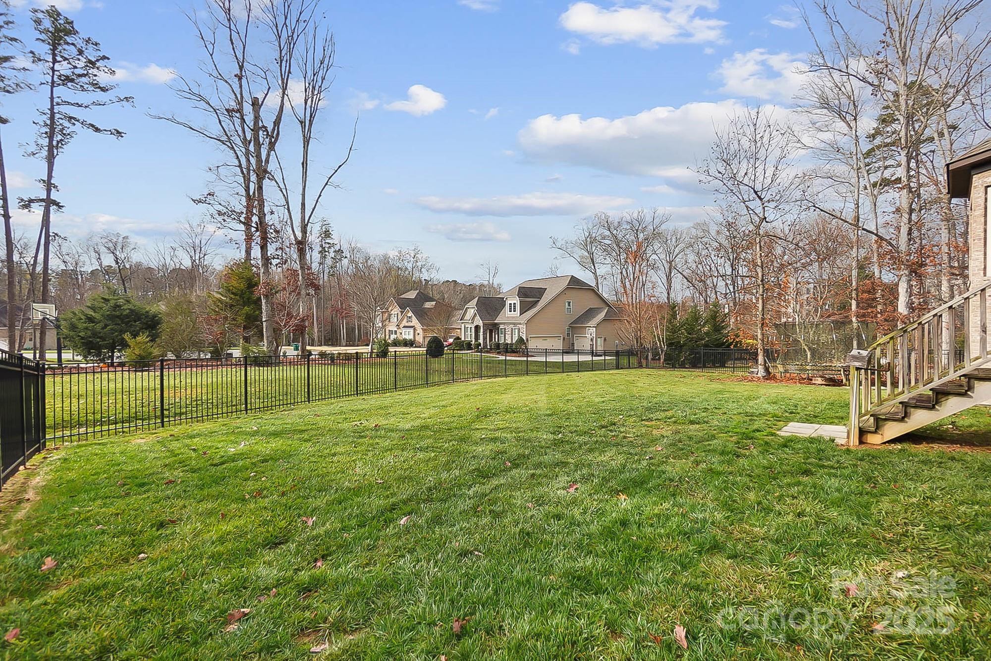 1419 Vickery Drive Matthews, NC 28104 - Photo 45 of 48 a view of a park with large trees