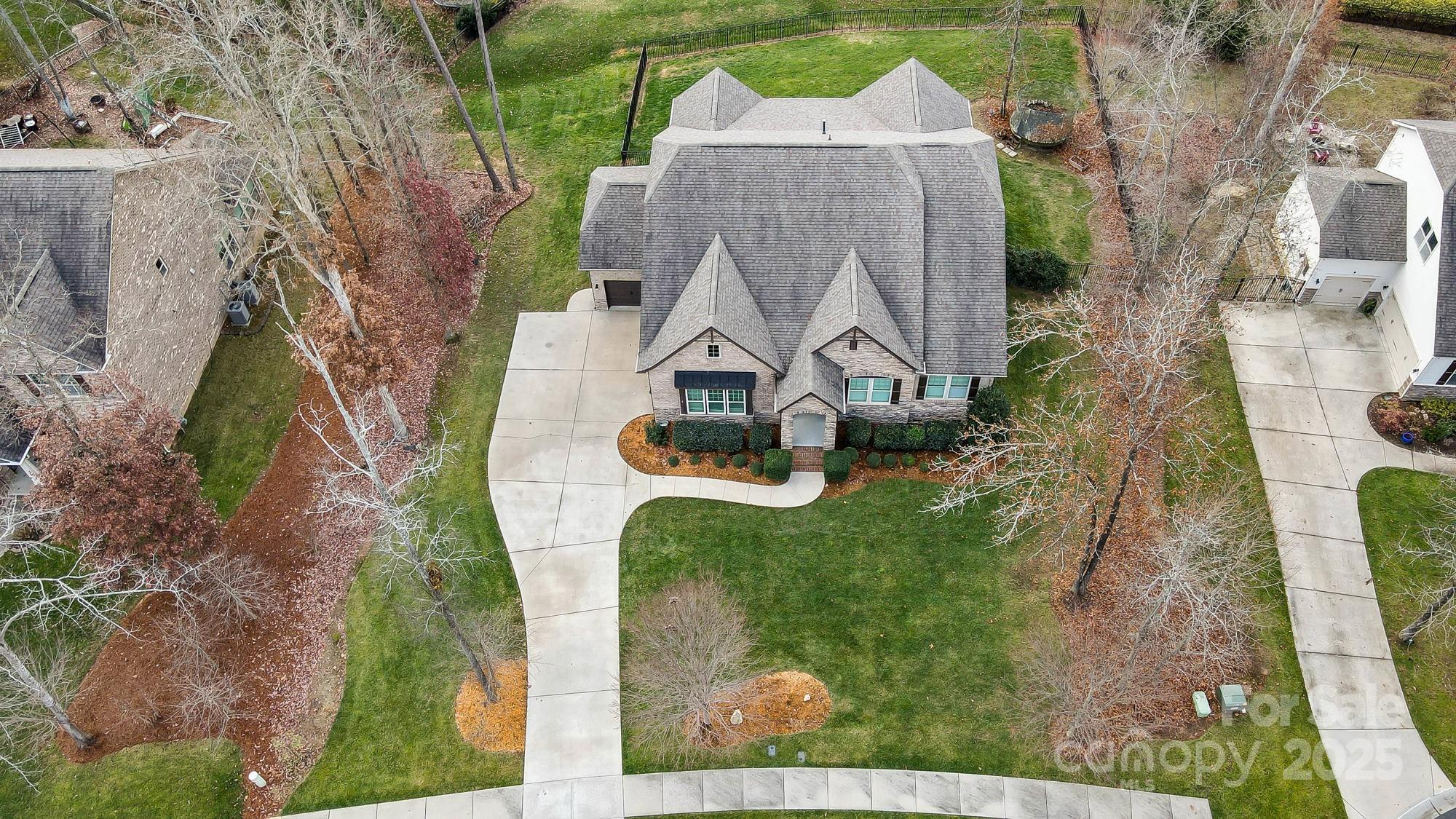 1419 Vickery Drive Matthews, NC 28104 - Photo 48 of 48 an aerial view of a house with outdoor space