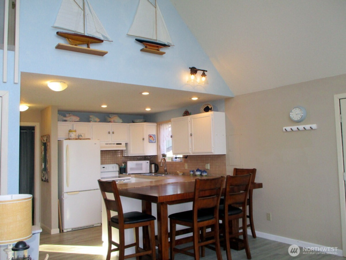 369 North Razor Clam Drive Southwest Ocean Shores, WA 98569 - Photo 24 of 27 a view of a dining room with furniture