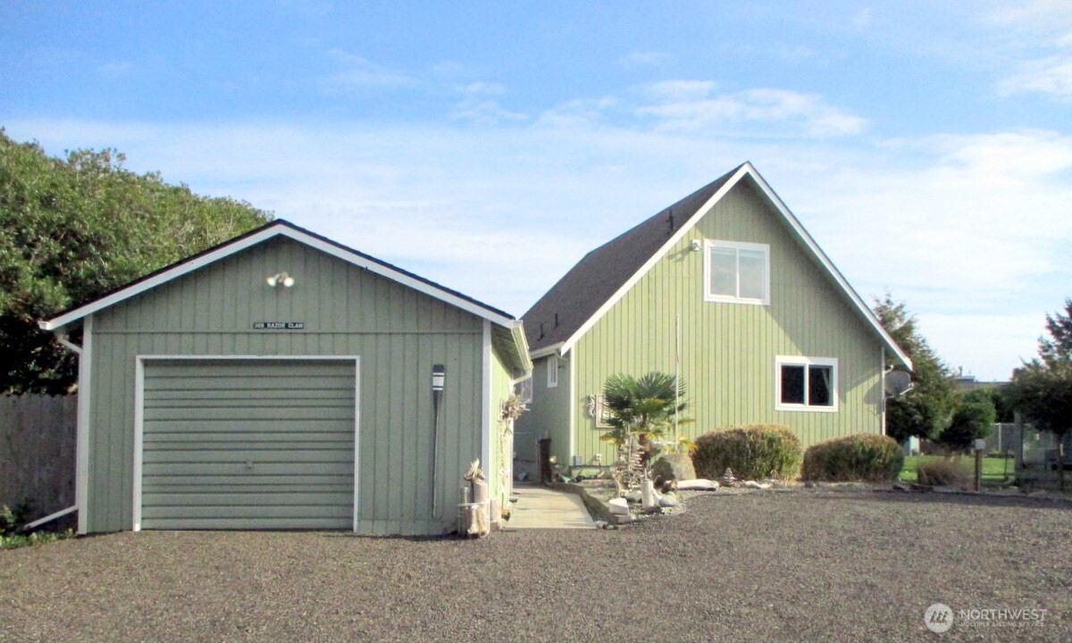 369 North Razor Clam Drive Southwest Ocean Shores, WA 98569 - Photo 25 of 27 a view of a house with backyard