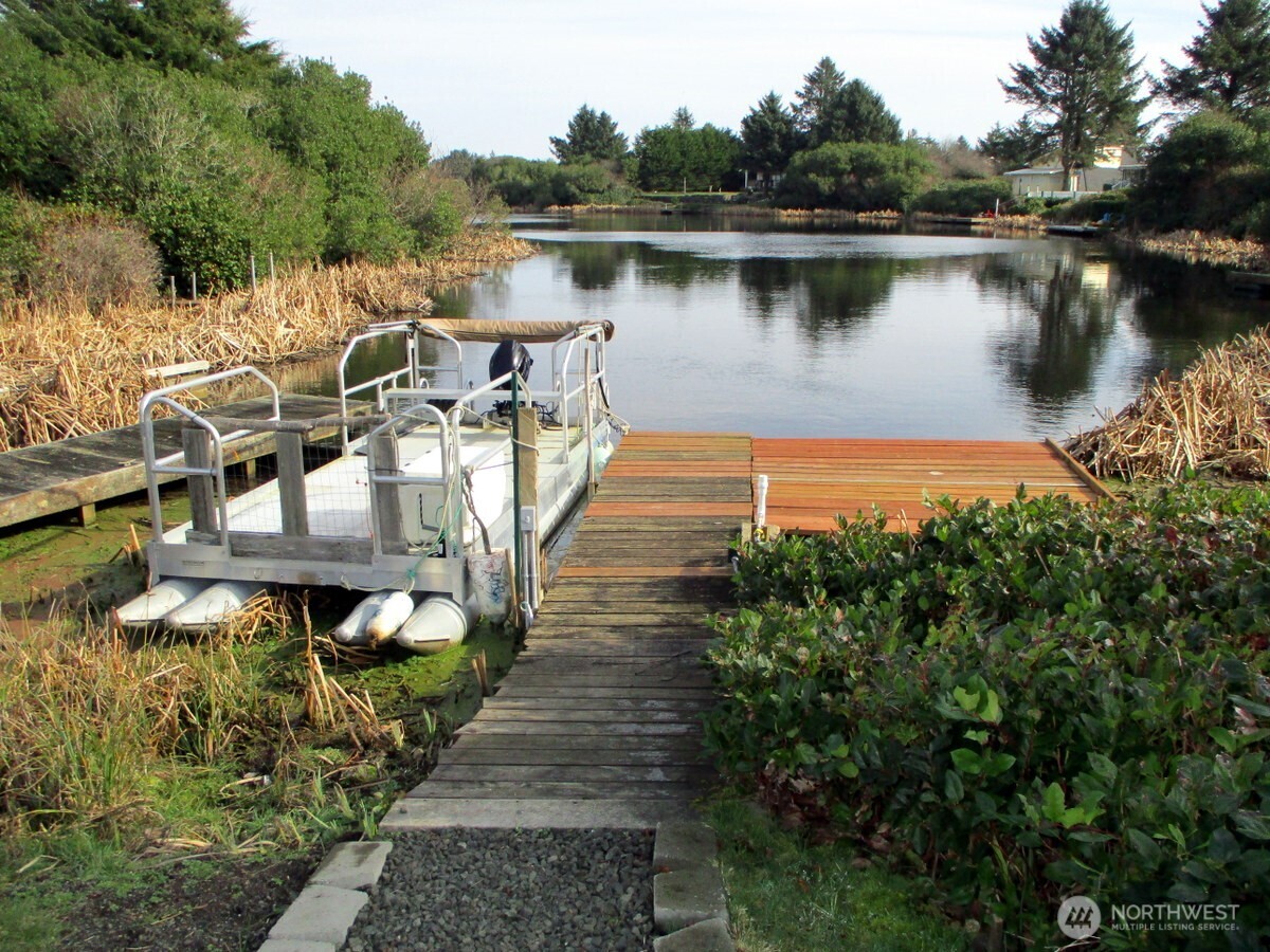 369 North Razor Clam Drive Southwest Ocean Shores, WA 98569 - Photo 26 of 27 a view of a lake with sitting area
