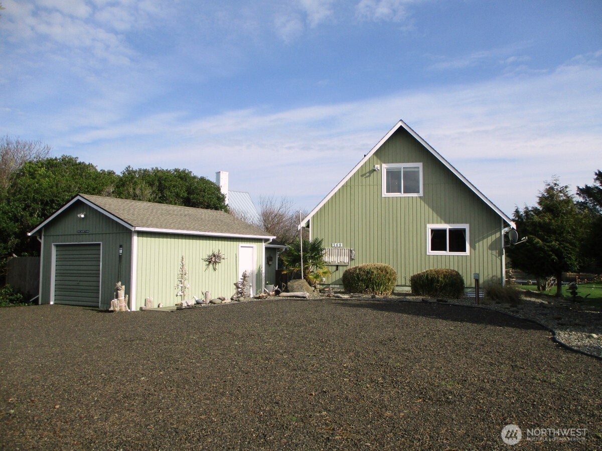 369 North Razor Clam Drive Southwest Ocean Shores, WA 98569 - Photo 4 of 27 a view of house with backyard