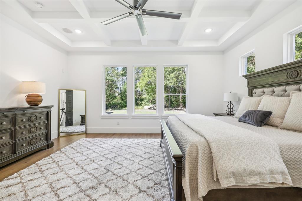 478 Polly Road Sunnyvale, TX 75182 - Photo 16 of 40 Bedroom with coffered ceiling, wood finished floors, beam ceiling, recessed lighting, and ceiling fan