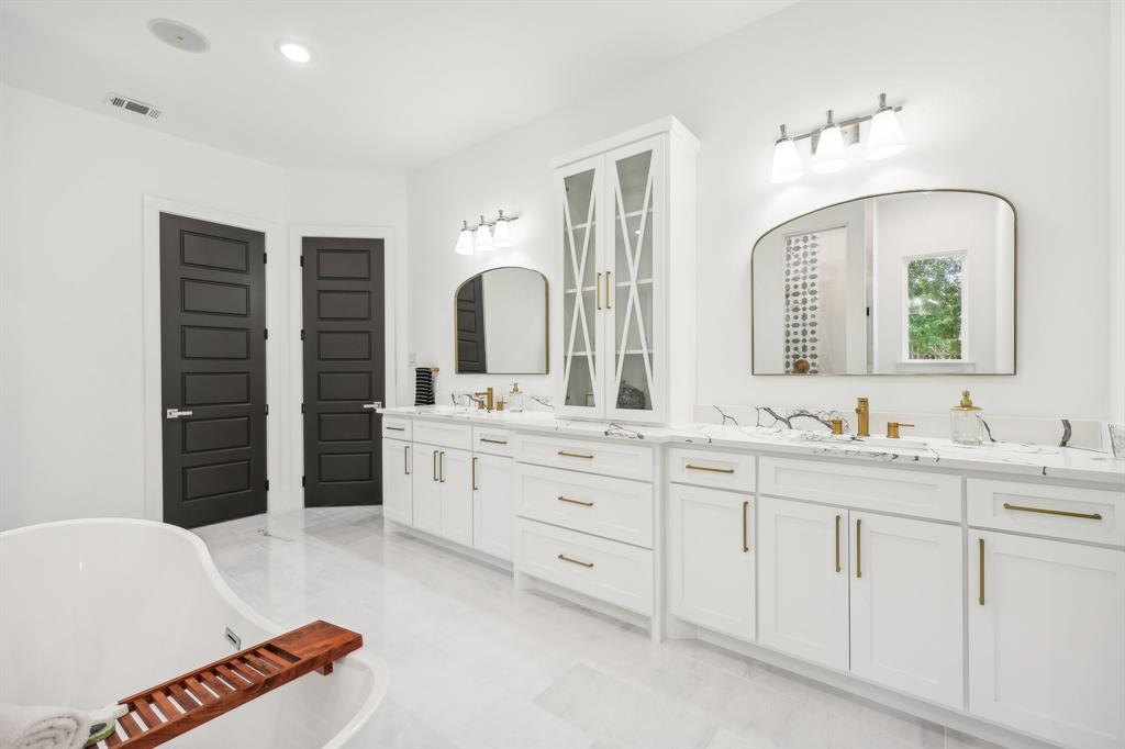 478 Polly Road Sunnyvale, TX 75182 - Photo 17 of 40 Bathroom with double vanity, a freestanding tub, and recessed lighting