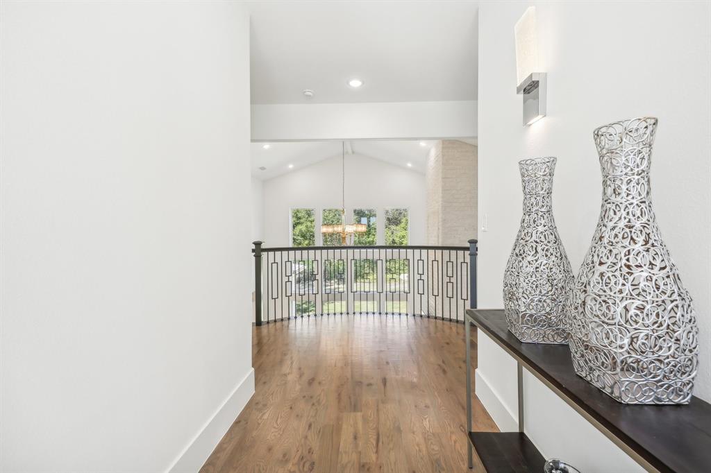 478 Polly Road Sunnyvale, TX 75182 - Photo 23 of 40 Hall featuring a chandelier, wood finished floors, recessed lighting, and high vaulted ceiling