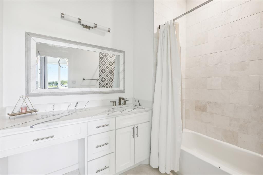 478 Polly Road Sunnyvale, TX 75182 - Photo 26 of 40 Full bathroom with vanity and shower / bathtub combination with curtain