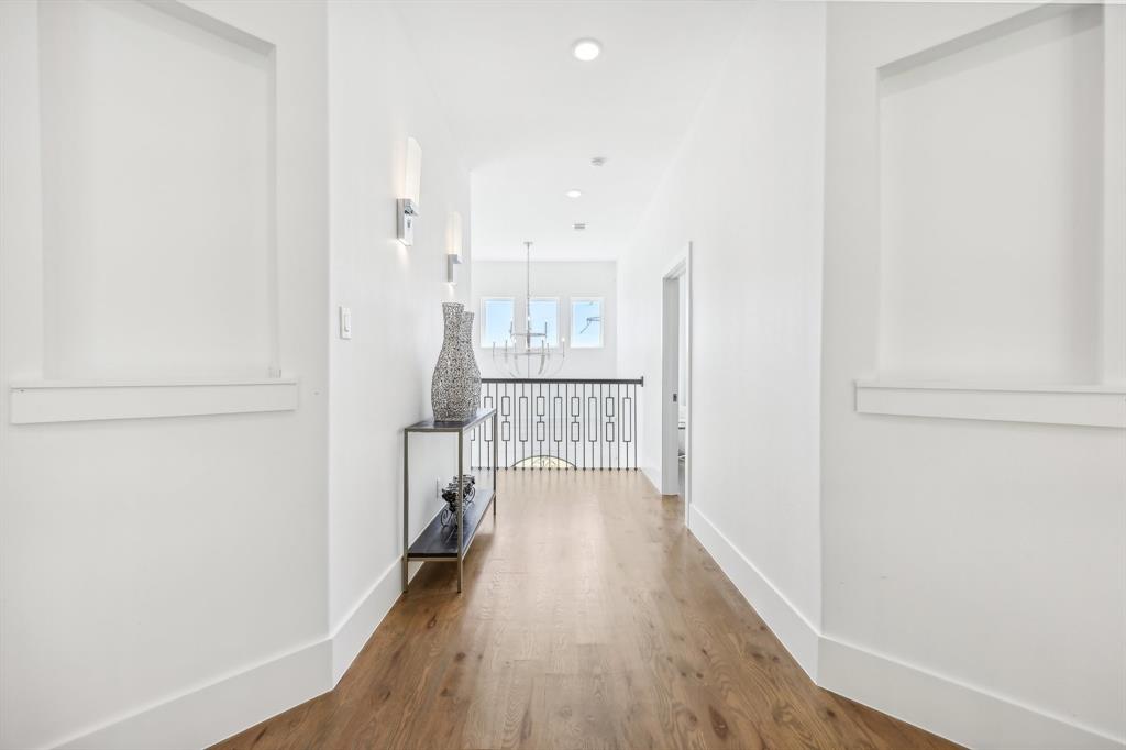 478 Polly Road Sunnyvale, TX 75182 - Photo 31 of 40 Corridor with a chandelier, wood finished floors, and recessed lighting