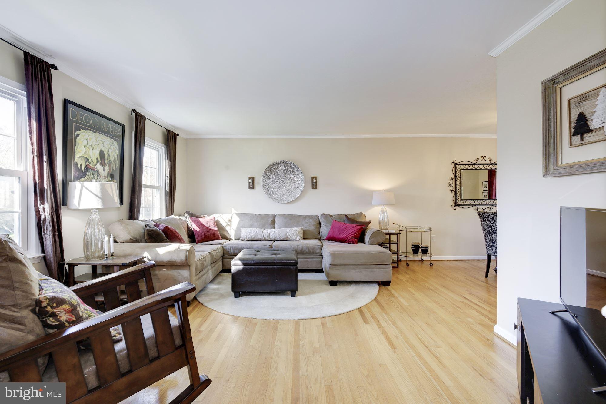 With Gleaming Hardwood Floors