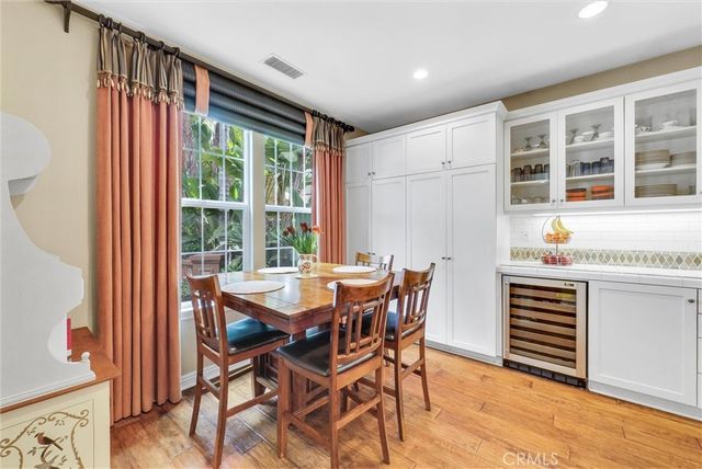 a spacious bathroom with a granite countertop tub sink shower and a mirror