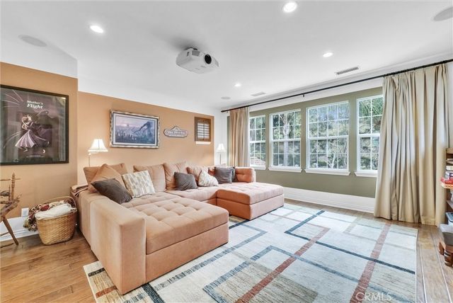 a view of hallway with wooden floor