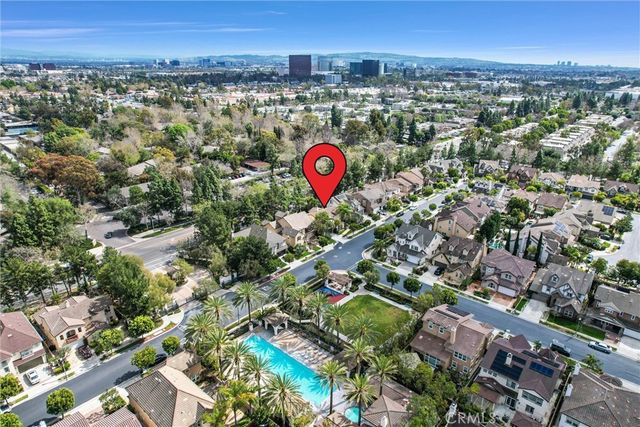 a kitchen with stainless steel appliances granite countertop a stove and refrigerator