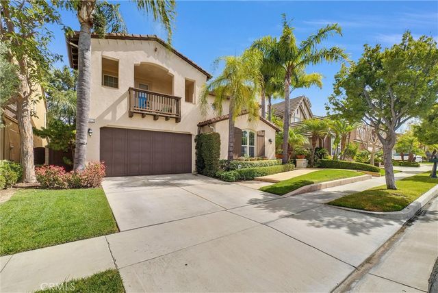 a view of a livingroom with wooden floor and a window