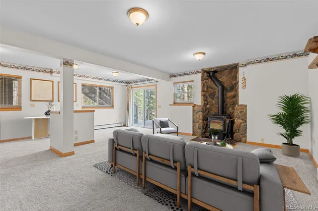 a room with furniture and a window