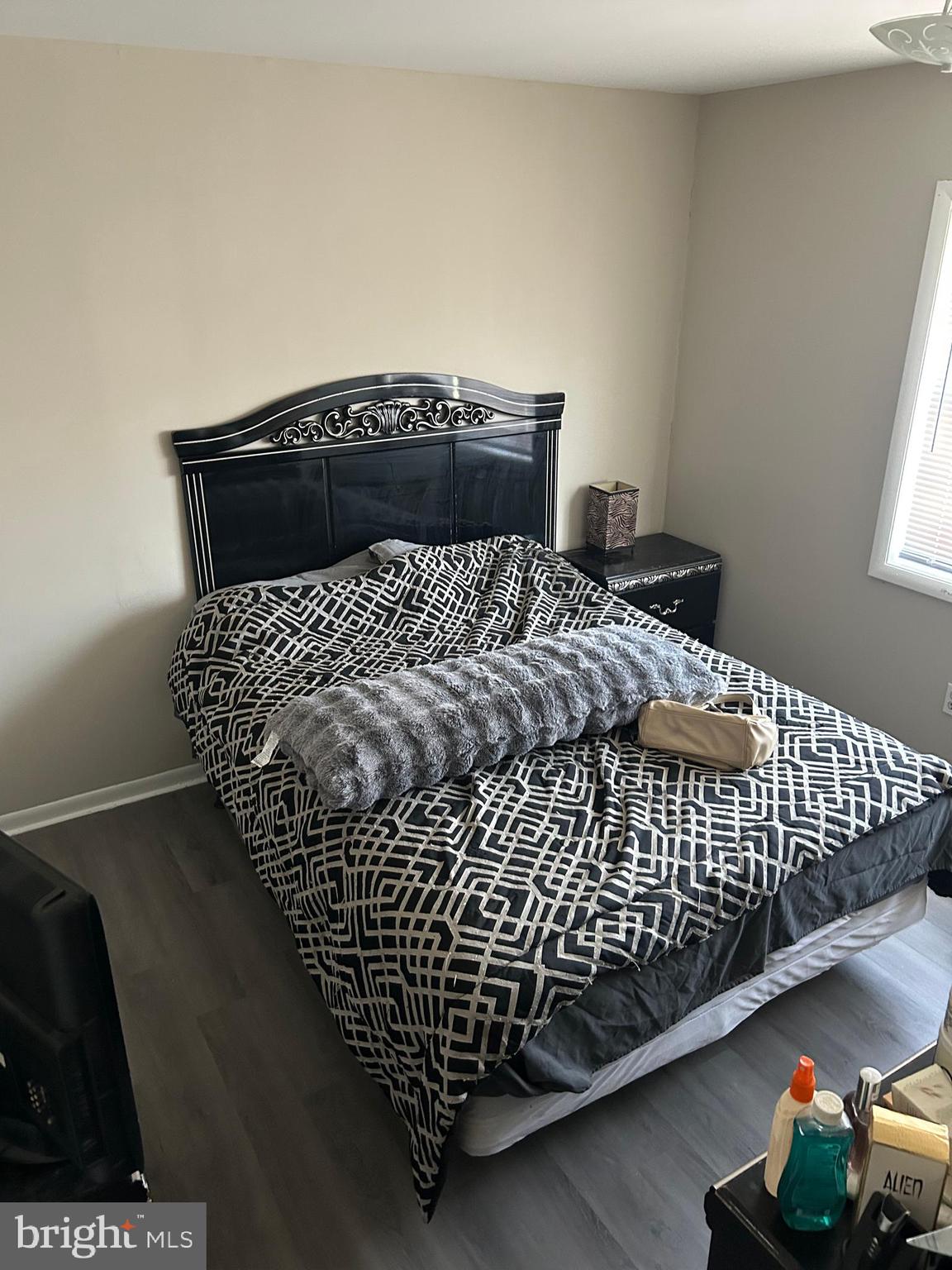 220 Whitherspoon Lane Newark, DE 19713 - Photo 6 of 6 a bed sitting in a bedroom next to a window