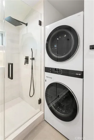 a view of a livingroom with a fireplace a fireplace and window