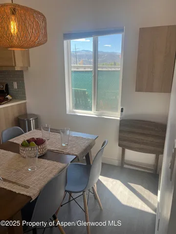 a workspace with furniture and window