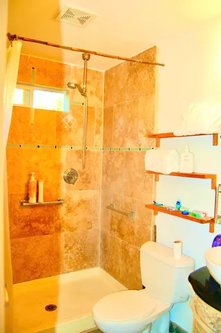 a bathroom with a sink and a shower