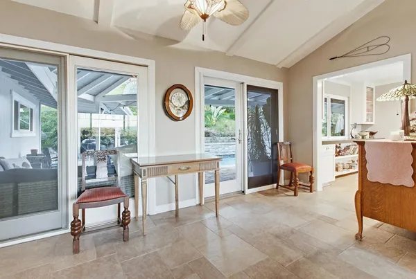 a open kitchen with dining table and chairs