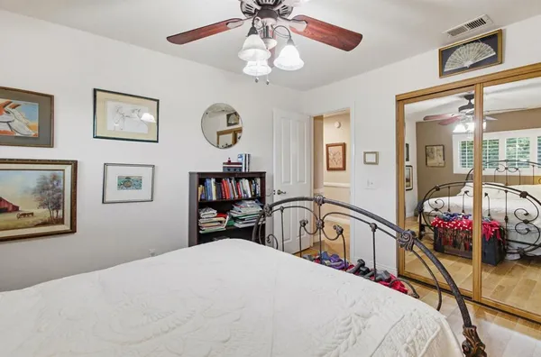 a view of a chairs and table in the balcony