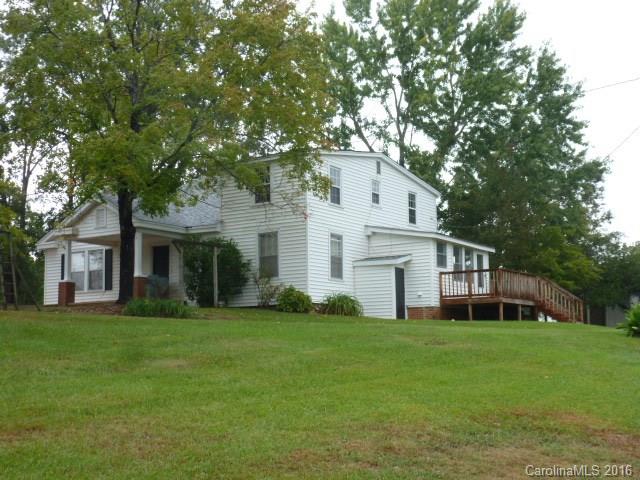 4852 Rowell Road Lancaster, SC 29720 - Photo 2 of 24 a view of a house with a yard
