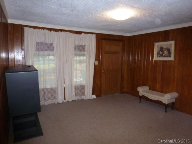 4852 Rowell Road Lancaster, SC 29720 - Photo 12 of 24 a view of a livingroom with furniture and staircase