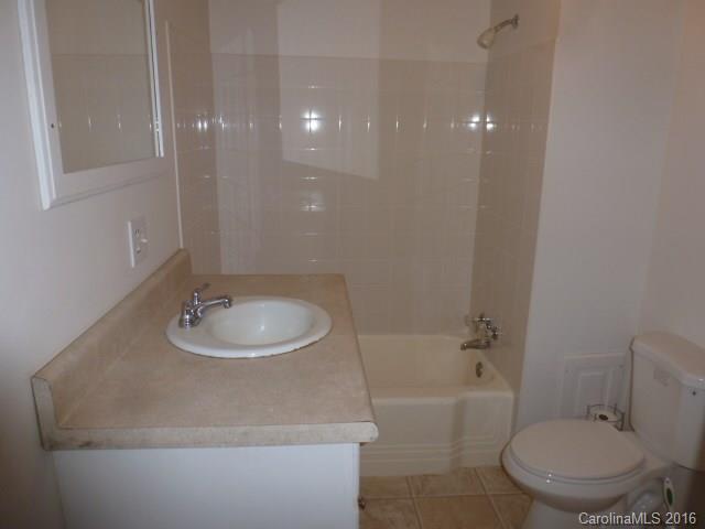 4852 Rowell Road Lancaster, SC 29720 - Photo 20 of 24 a bathroom with a sink toilet and shower